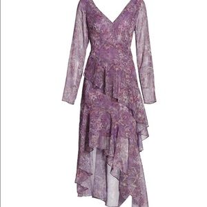 Designer Marchesa Notte asymmetrical lilac dress.
